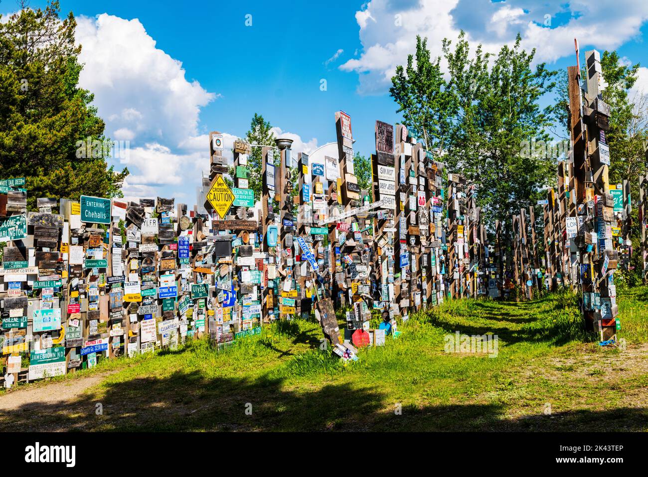 Travelers post over 100,000 signs at the Watson Lake Sign Post Forest; Watson Lake; Yukon Territories; Canada Stock Photo