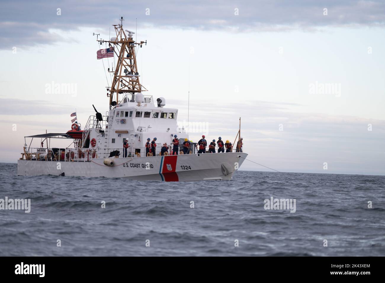 U.S. Coast Guard Cutter Key Largo (WPB 1324) is seen with crew working on the focsle, Atlantic Ocean, Sep. 12, 2022. The cutter was engaging in a towing evolution. (U.S. Coast Guard photo by Petty Officer 3rd Class Matthew Abban) Stock Photo