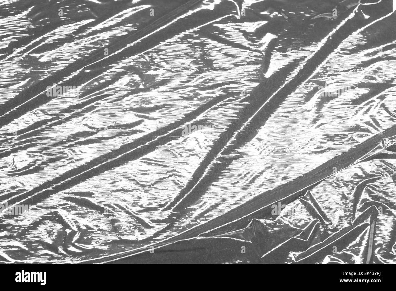 Reflecting light and shadow on creases and folds in plastic sheeting