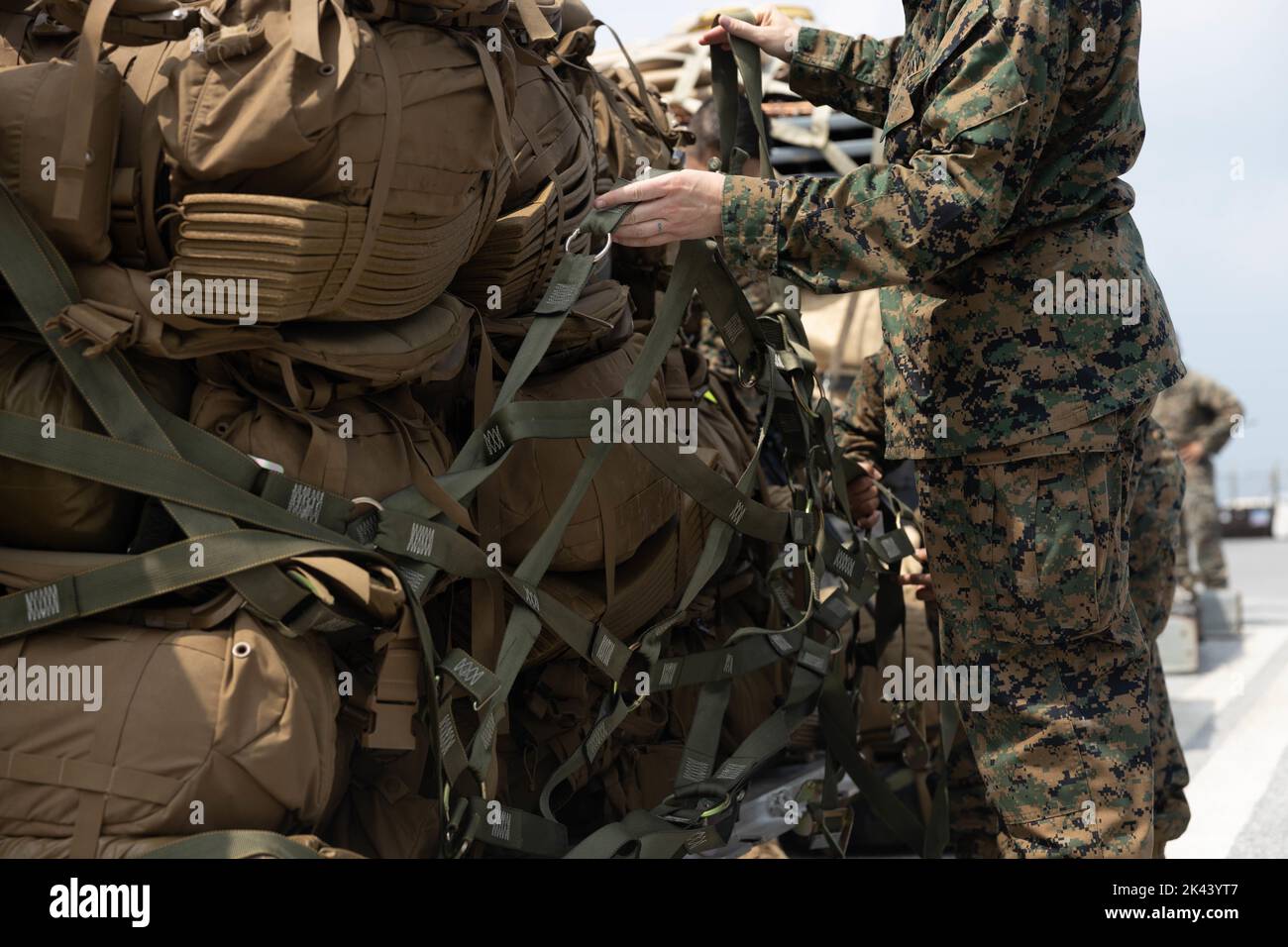 U.S. Marines with 3d Marine Division palletize gear in preparation to depart Okinawa, Japan during an Alert Contingency Marine Air-Ground Task Force drill, initiating the deployment of the division’s Forward Command Element participating in KAMANDAG 6 in the Philippines, Sept. 27, 2022.  during a rapid response drill to start exercise KAMANDAG 6, Kadena Air Base, Okinawa, Japan, Sept. 27, 2022. KAMANDAG is an annual bilateral exercise between the Armed Forces of the Philippines and U.S. military designed to strengthen interoperability, capabilities, trust, and cooperation built over decades of Stock Photo