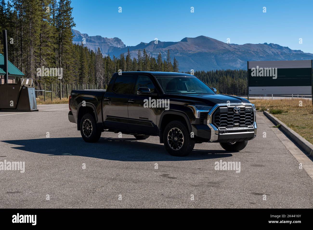A new black 2022 Toyota Tundra full size, four door pick up at a rest ...
