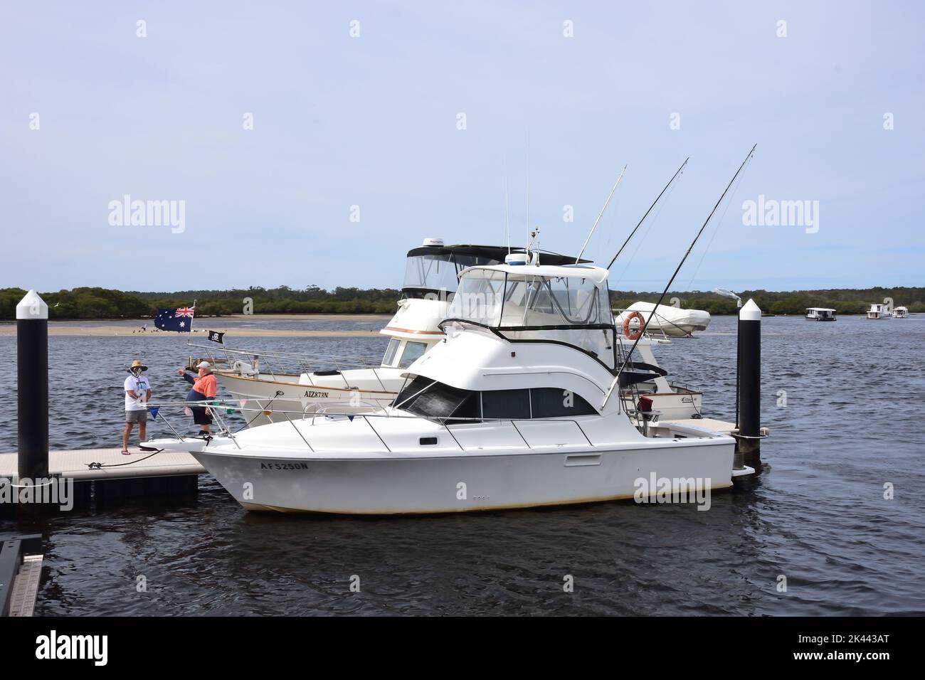 Fishing boats moored in the Myall River at Tea Gardens NSW Australia, Stock Photo