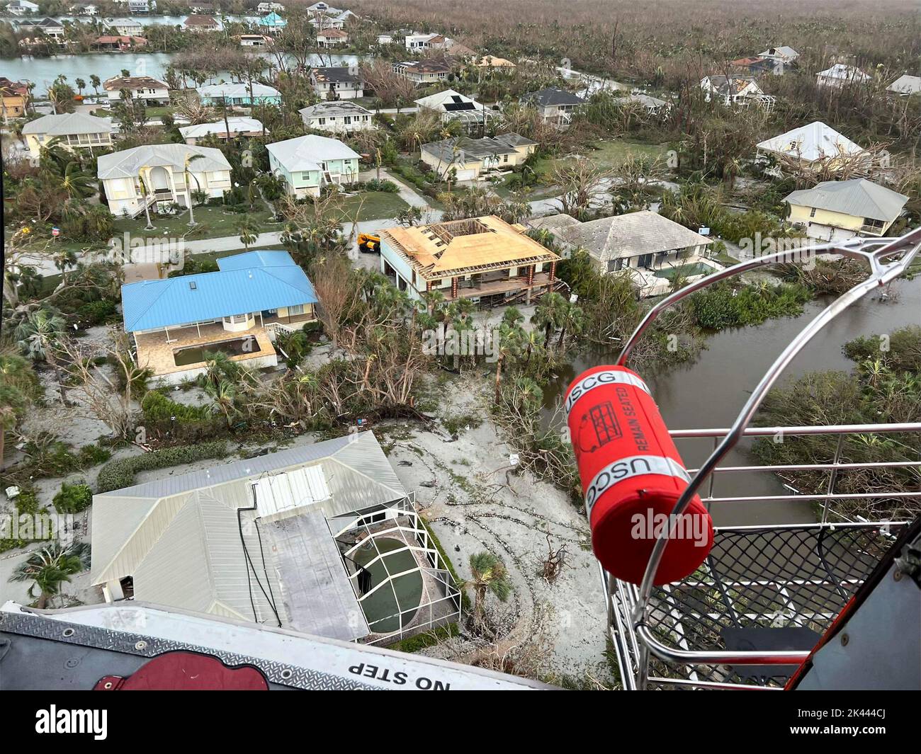 Sanibel, United States. 29th Sep, 2022. A U.S. Coast Guard helicopter searches for stranded residents from their flooded neighborhoods damaged by the massive Category 4 Hurricane Ian, that pounded the west coast of Florida, September 29, 2022 in Sanibel, Florida. Credit: Joey Feldman/US Coast Guard/Alamy Live News Stock Photo