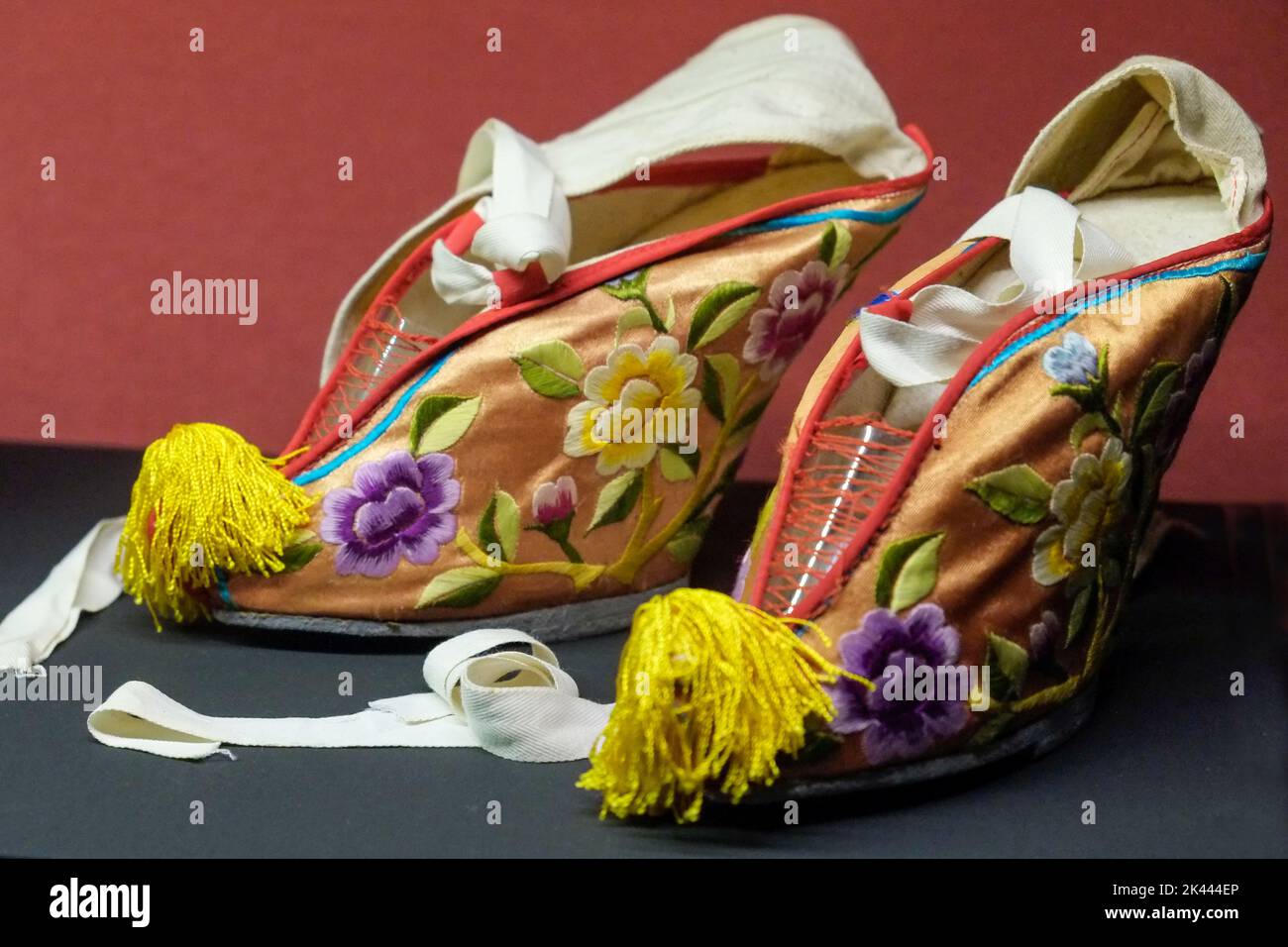 Lisbon, Portugal. Europe. Antique Chinese shoes for bound feet. Stock Photo