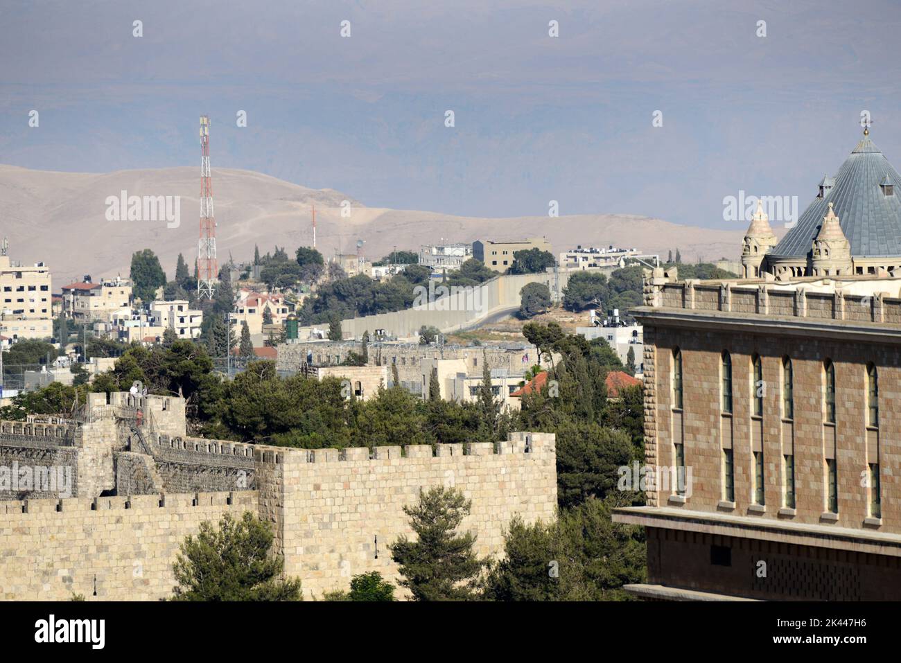 A view of the old city in Jerusalem with the Judean desert and Jordanian mountains in the background. Stock Photo