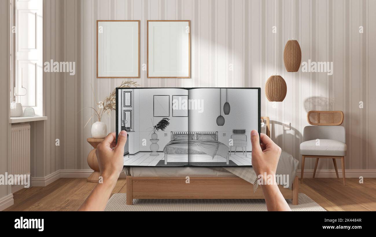 Hands holding notepad with wooden bedroom design blueprint sketch or ...
