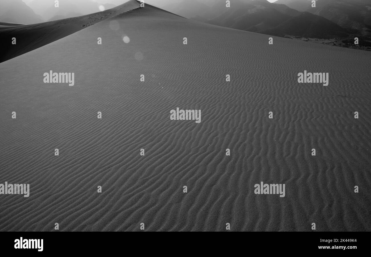 Sand dunes mountains blue sky Black and White Stock Photos & Images - Alamy