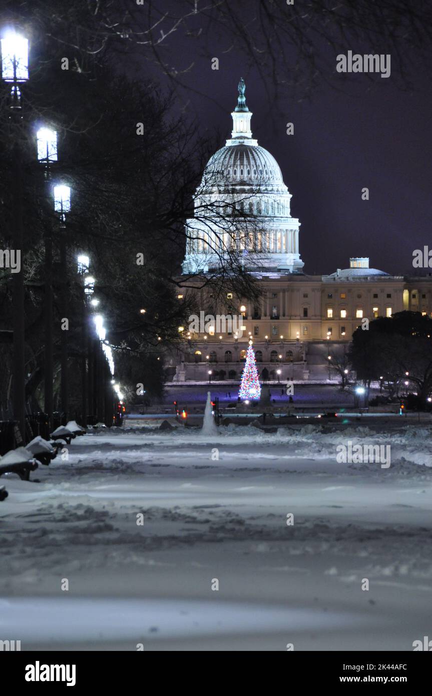 A night time view of the US Capitol during winter nearing Christmas. Stock Photo