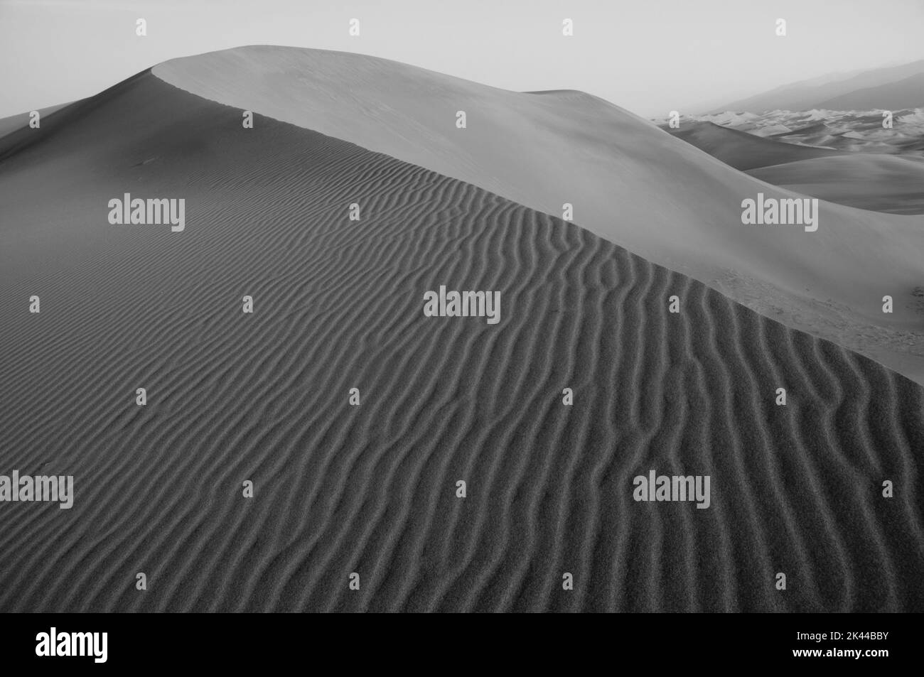 Sand dunes mountains blue sky Black and White Stock Photos & Images - Alamy