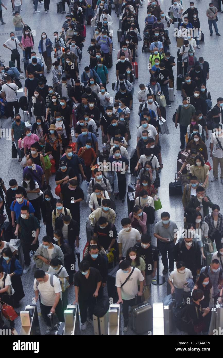 HANGZHOU, CHINA - SEPTEMBER 30, 2022 - Passengers pass through an ...