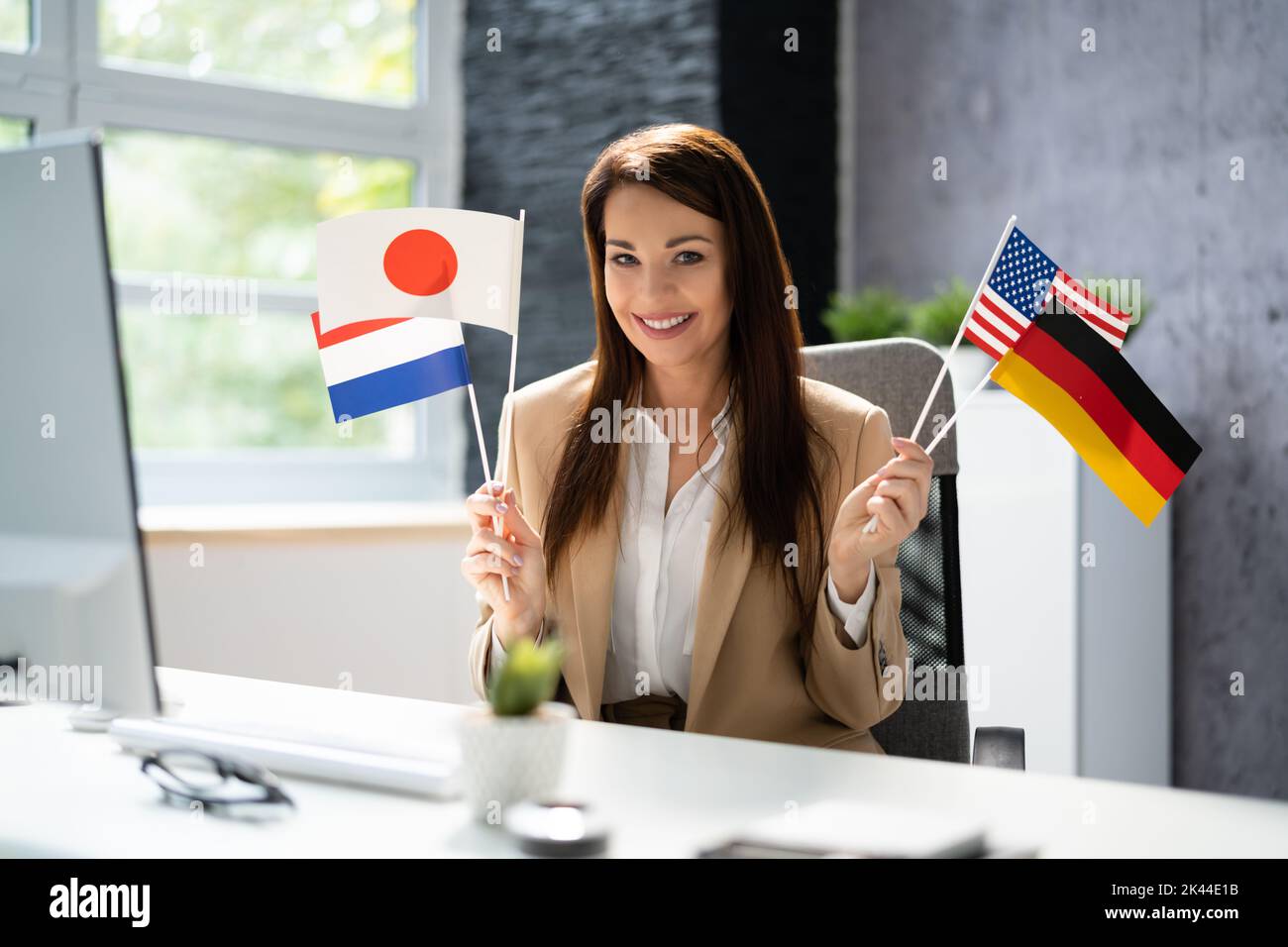 Foreign Language Learning Course. Young Happy Lady Studying Stock Photo