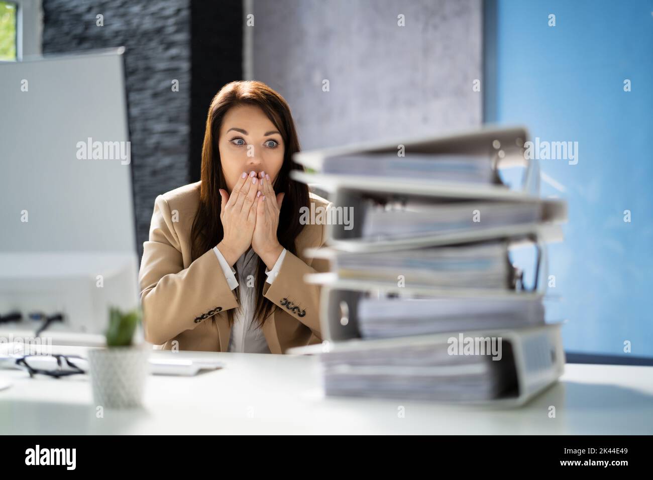 Workaholic Accountant Businesswoman With Headache And Stress Stock Photo