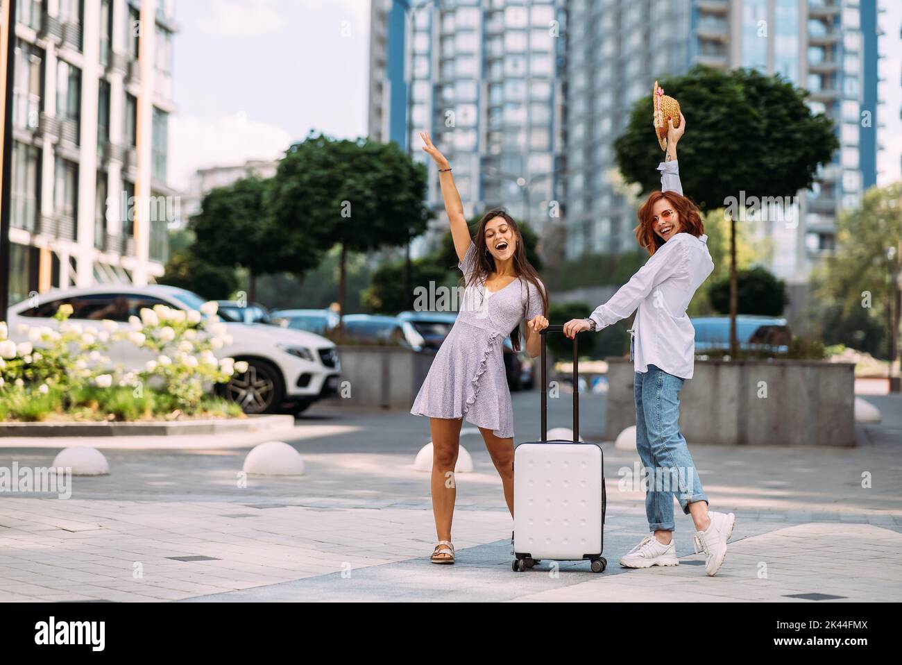 Two young women on the city street Stock Photo - Alamy