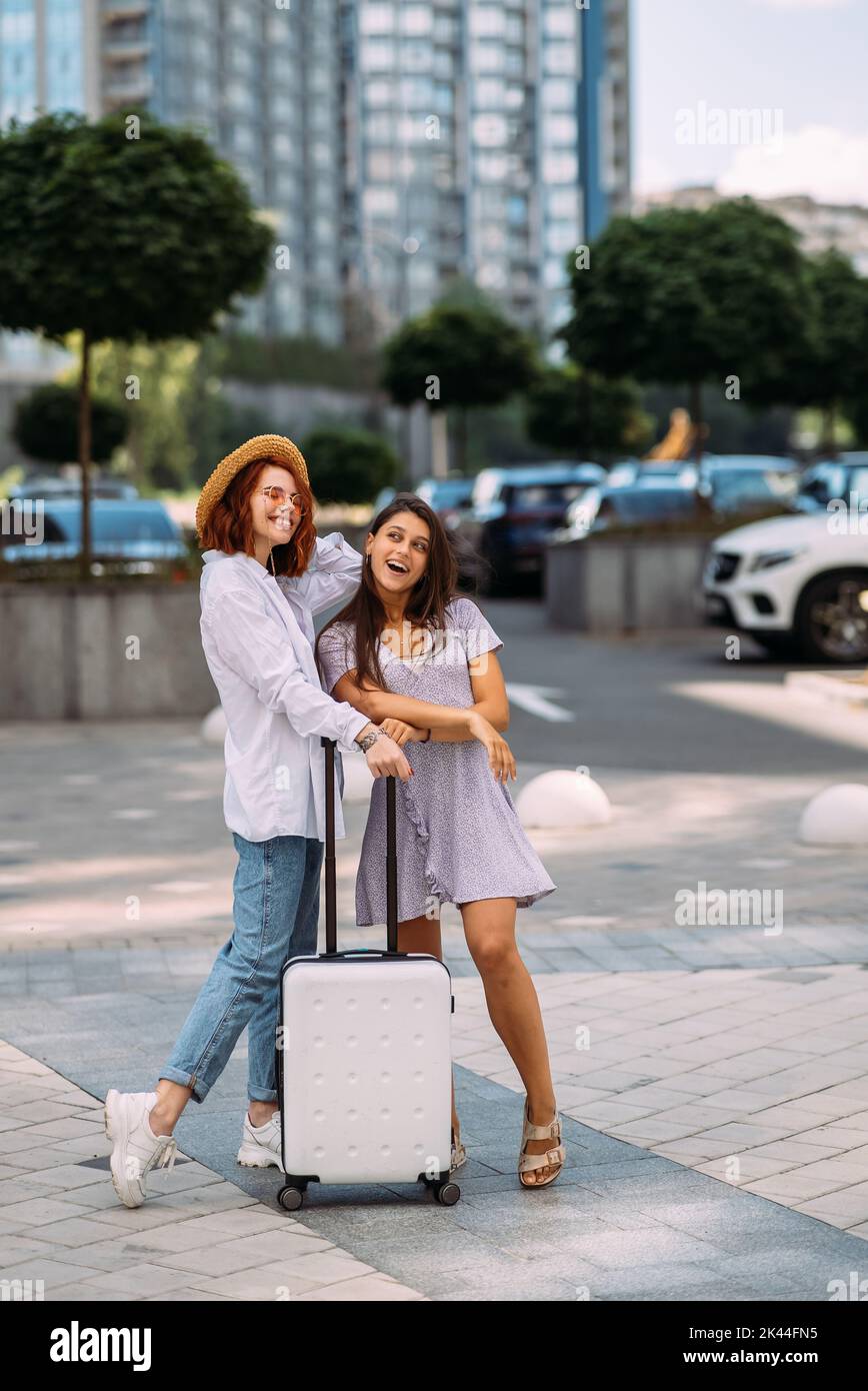 Two young women on the city street Stock Photo - Alamy