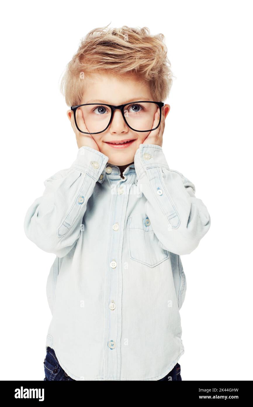 I only hear what I want. A sweet little boy wearing glasses covering his ears. Stock Photo