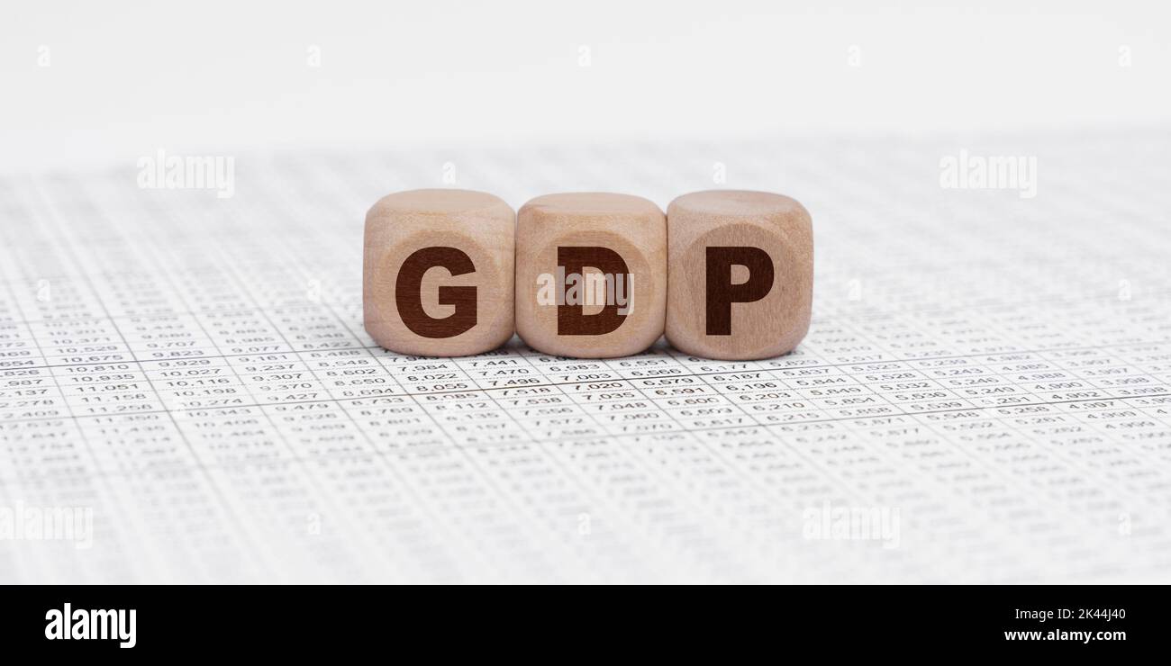 Business and finance concept. There are cubes on the reporting documents with the inscription - GDP Stock Photo