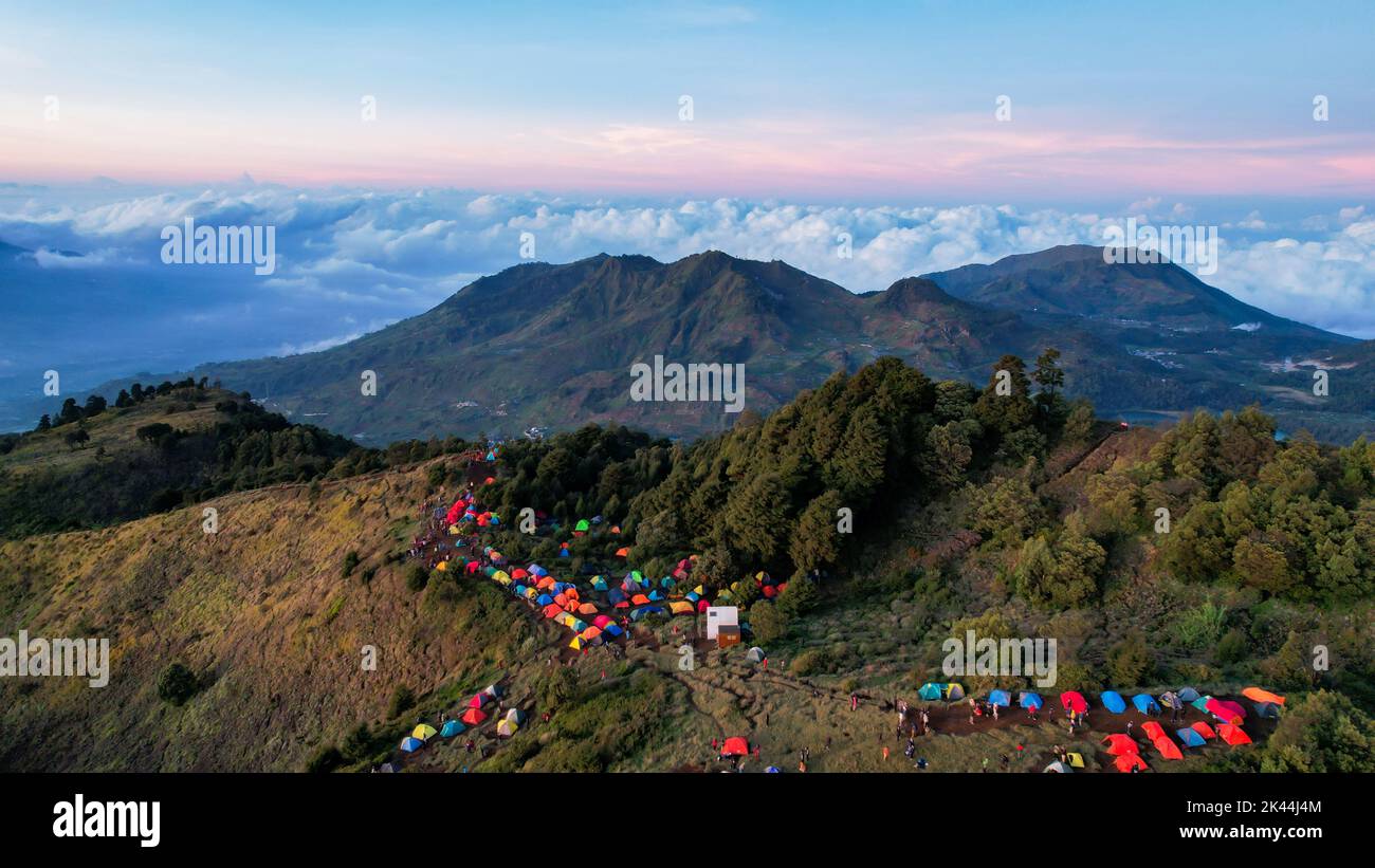 Aerial view of beauty mountain peaks Prau Dieng, Central Java and the climbers and tent. Wonosobo, Indonesia, September 30, 2022 Stock Photo