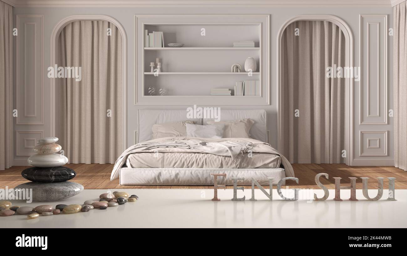 White table shelf with pebble balance and 3d letters making the word feng shui over classic