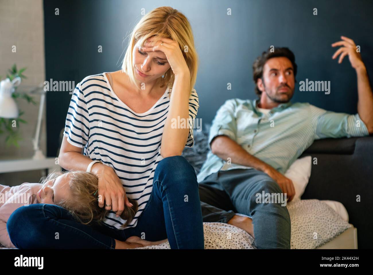 Young family with child having financial problems,depression,crisis. People divorce, stress concept. Stock Photo