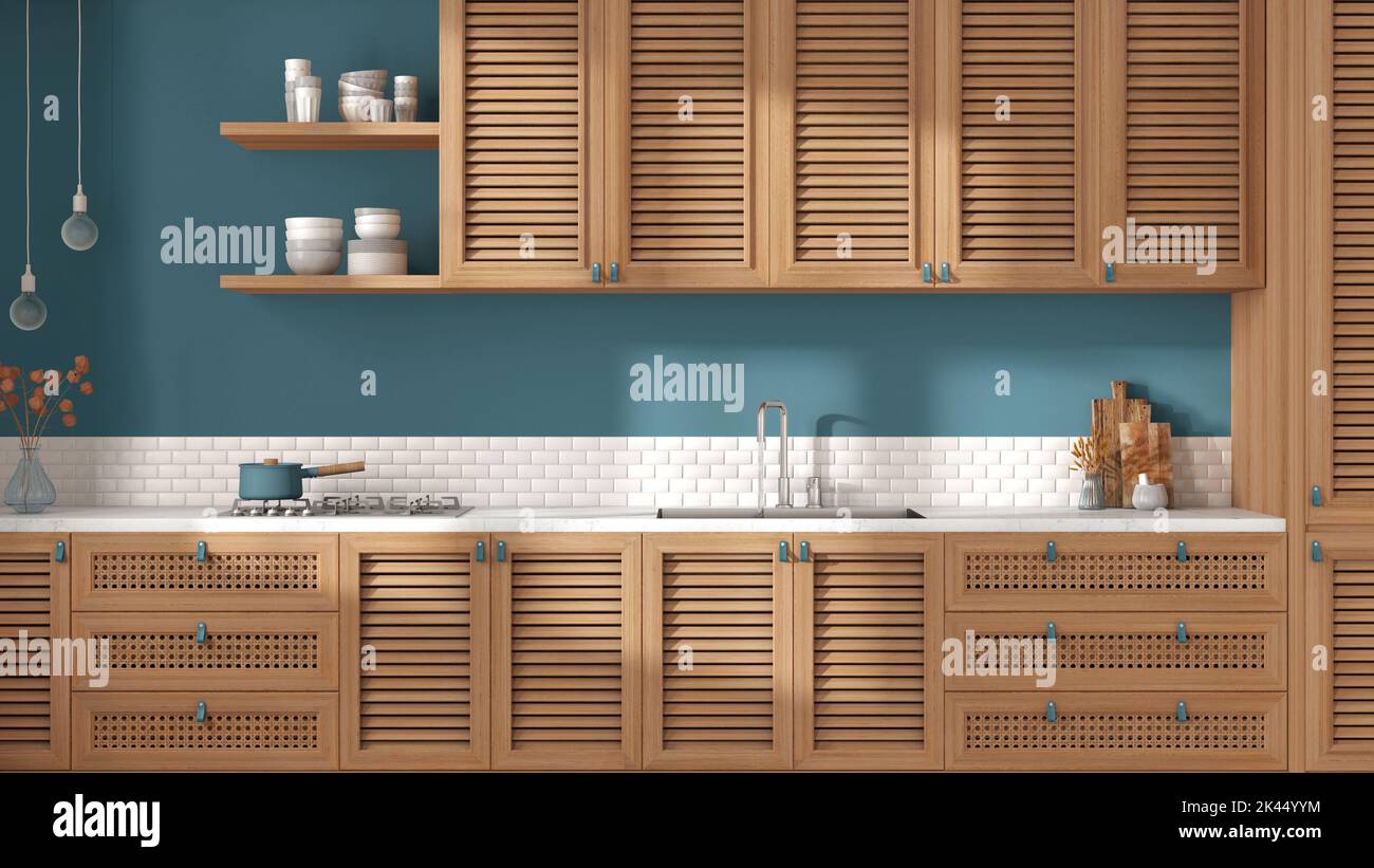 Vintage wooden kitchen in white and blue tones. with shutters