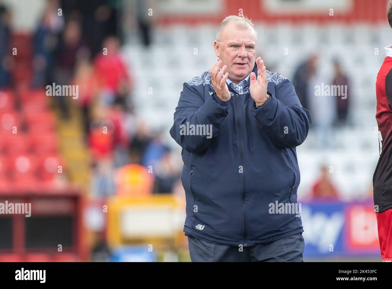 Football manager Steve Evans at Stevenage Football Club walking on