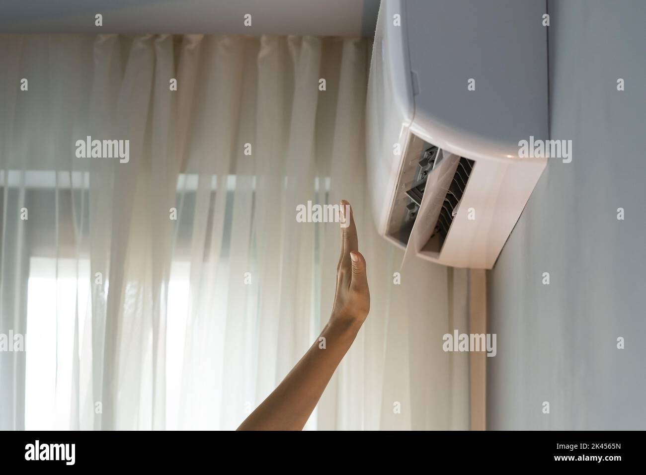 Apartment owner turns on air conditioner checking operating device