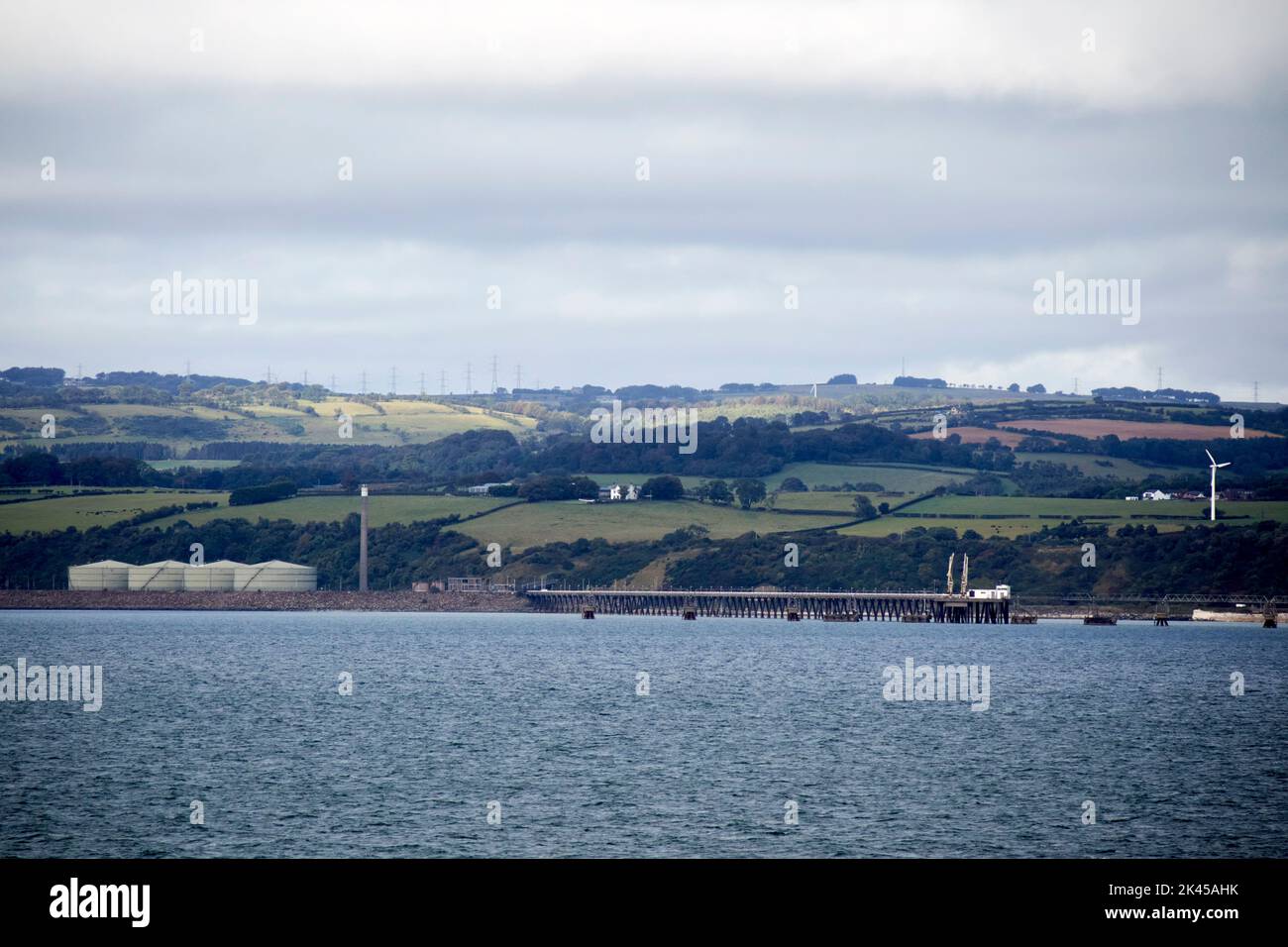 cloughan point jetty and oil storage facility on the shores of belfast lough county antrim northern ireland Stock Photo