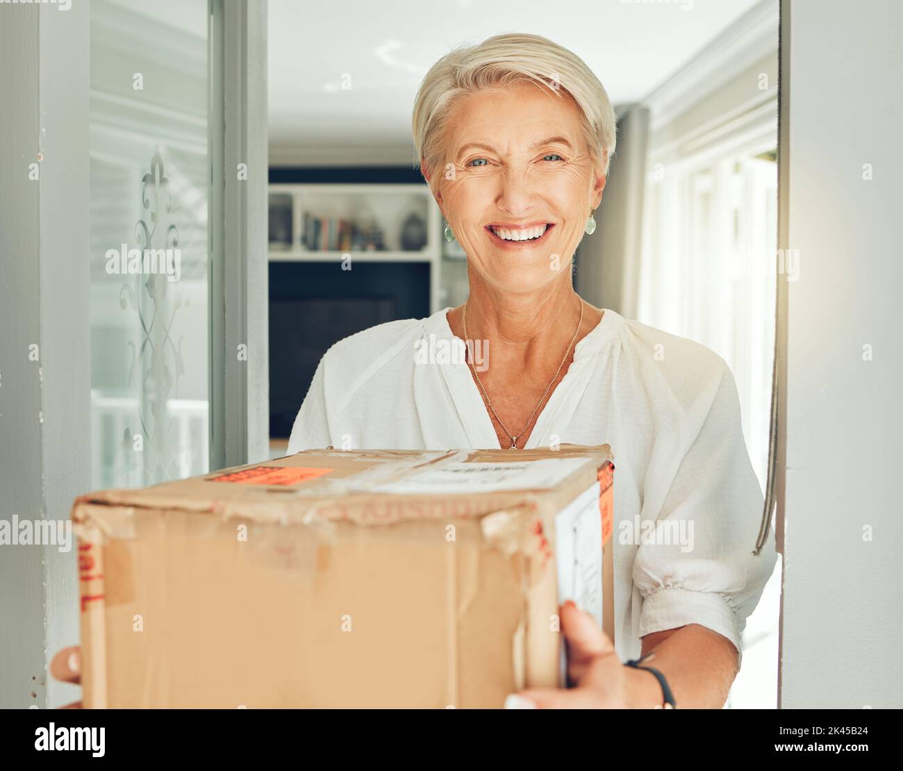Senior customer, delivery box and courier service at front door house