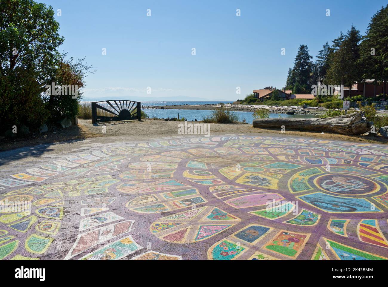 Roberts Creek community Mandala painted by the seashore.  Roberts Creek, BC, Canada, on the Sunshine Coast. Stock Photo