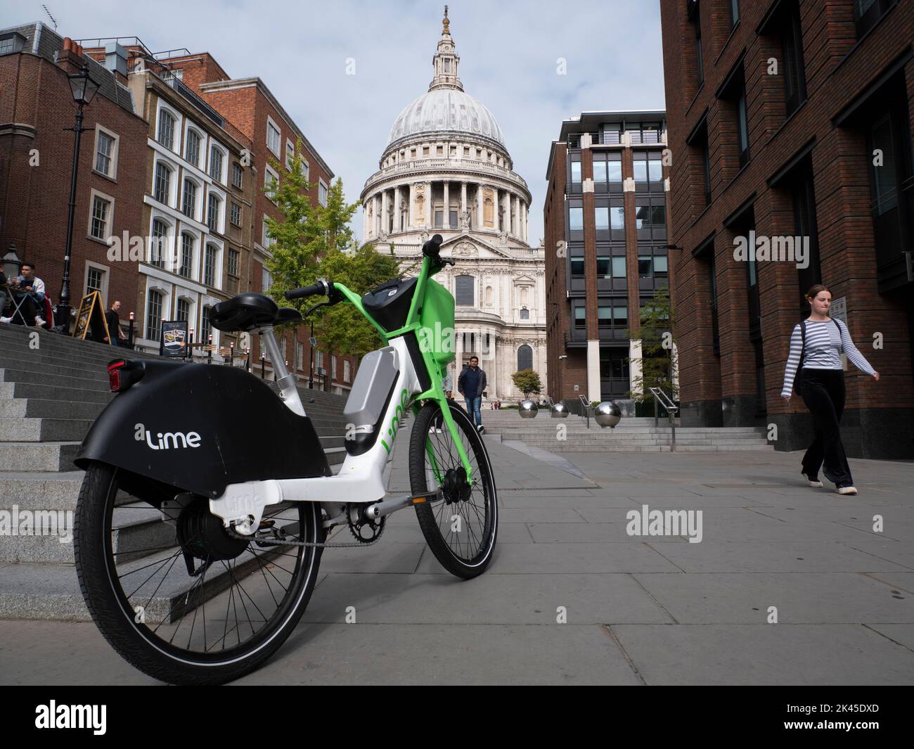 Lime Electric rental e-bike parked near St Pauls Cathedral, City of London, Stock Photo