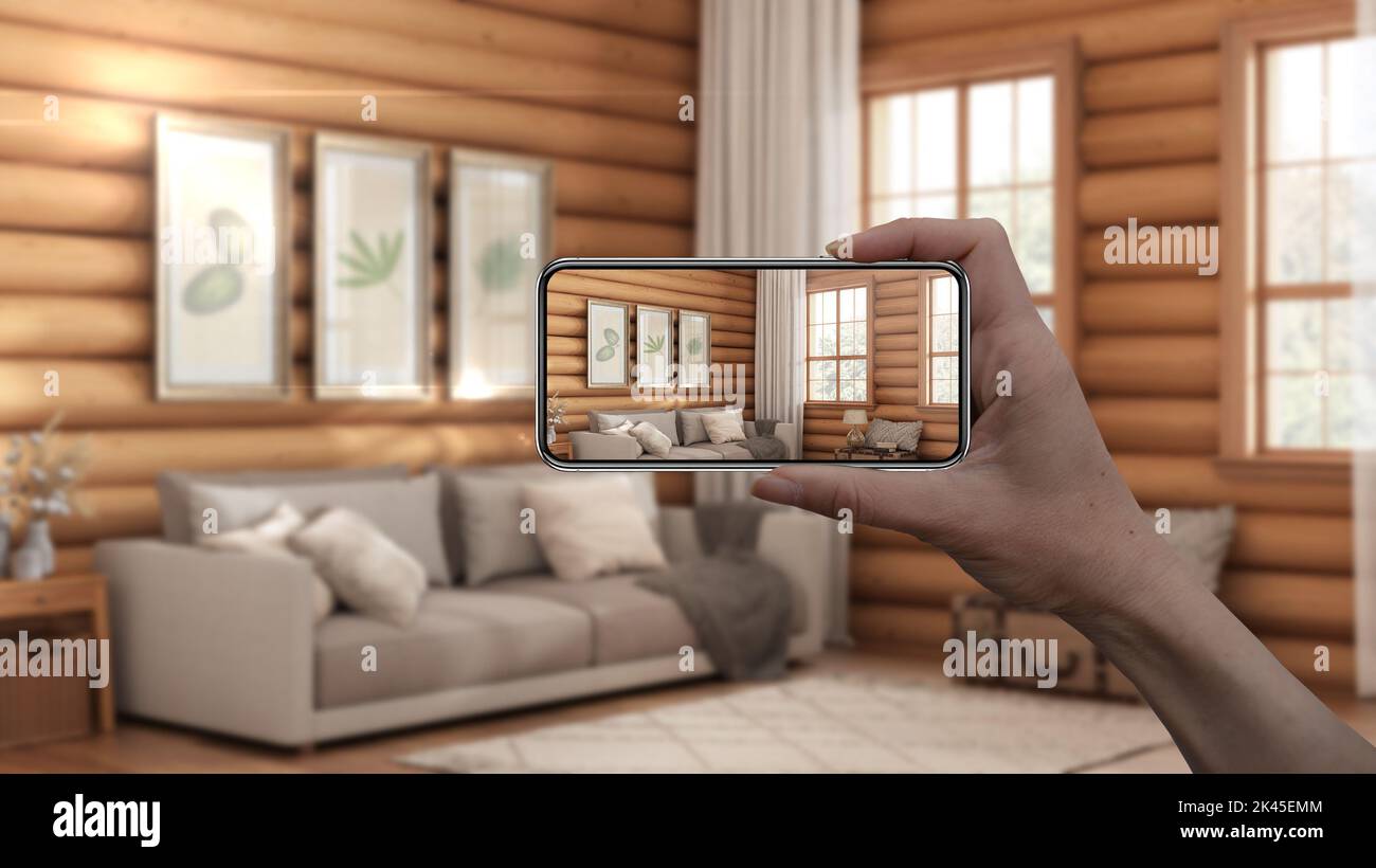 Hand holding smart phone, AR application, simulate furniture and ...