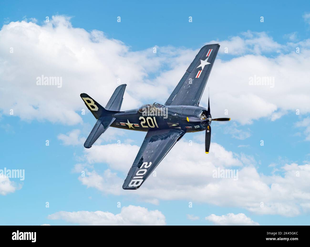 The Grumman F8F-2P Bearcat, a 1940s vintage American fighter plane flying at Duxford Imperial war museum airshow, Duxford UK Stock Photo