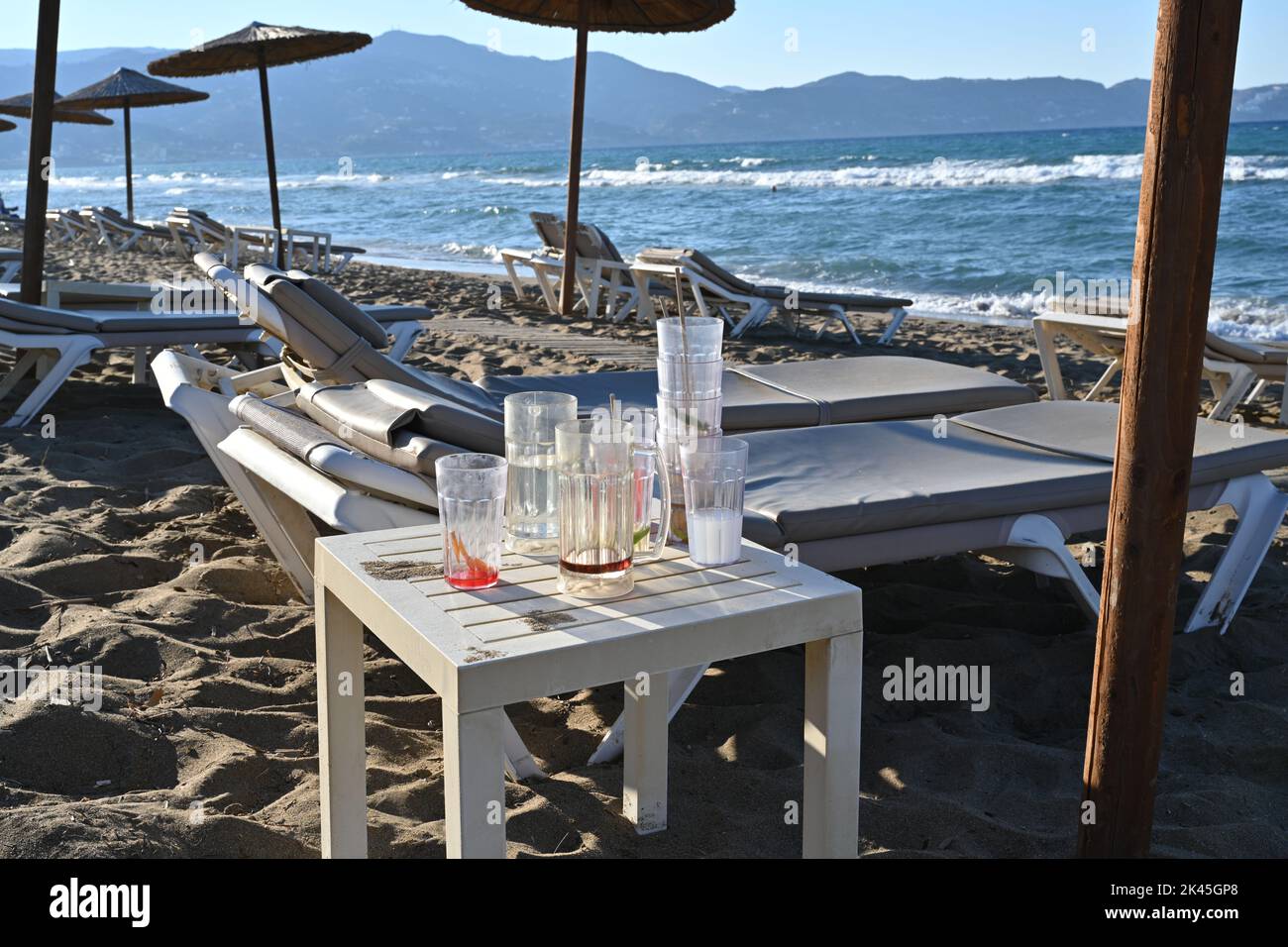 Empty deck chairs on seashore hi-res stock photography and images - Alamy