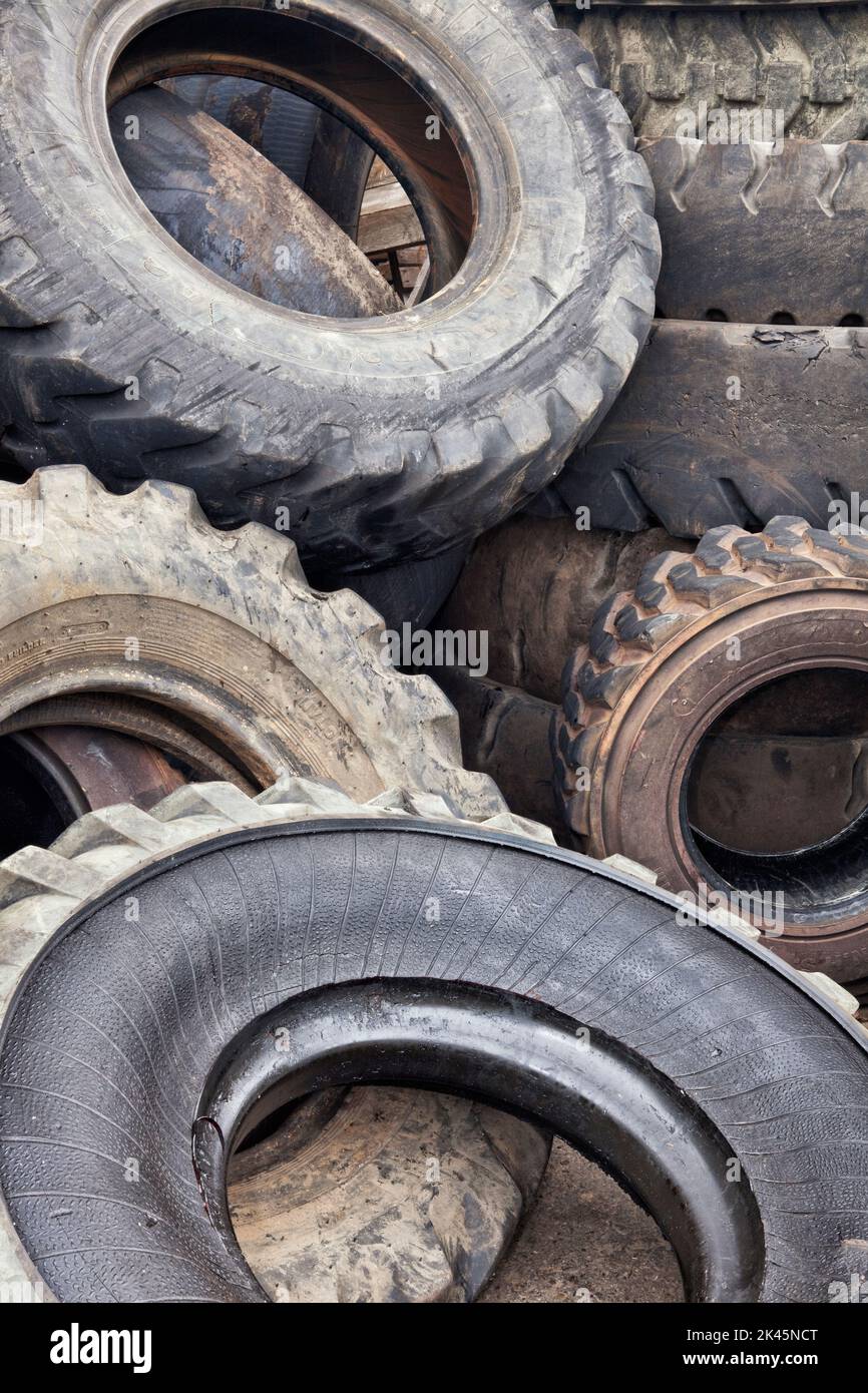 Close up of a heap of old vehicle rubber tyres. Stock Photo