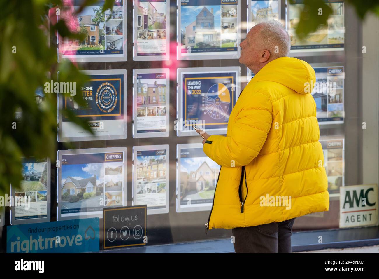 Picture dated September 29th shows people looking in estate agents windows in Ely,Cambridgeshire, as the worry about mortgage rises continue.   A mortgages “ticking time bomb” awaits if UK interest rates rises follow market predictions, Martin Lewis has warned. Speaking on ITV’s Good Morning Britain, the consumer champion suggested those with variable rate mortgages or fixed-rate deals coming to an end in the next three to five months could go on a comparison website to see what is currently available. Stock Photo