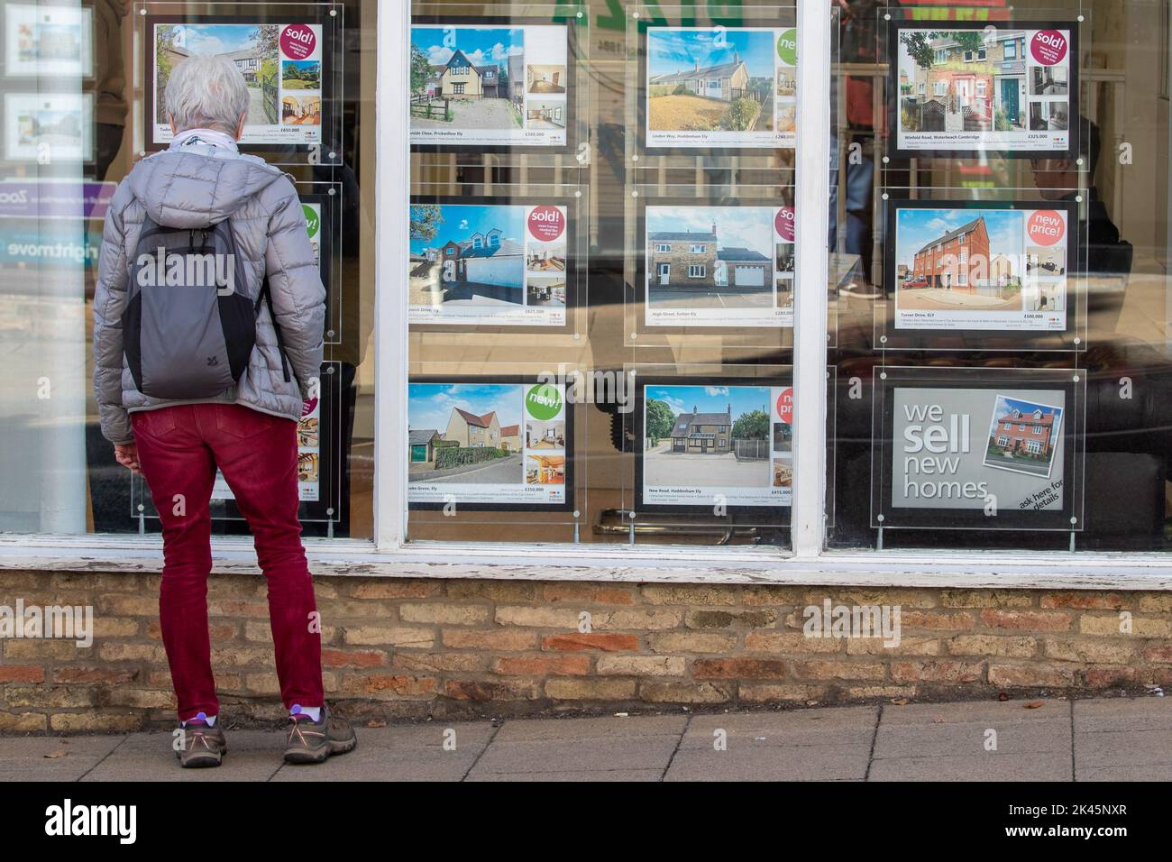 Picture dated September 29th shows people looking in estate agents windows in Ely,Cambridgeshire, as the worry about mortgage rises continue.   A mortgages “ticking time bomb” awaits if UK interest rates rises follow market predictions, Martin Lewis has warned. Speaking on ITV’s Good Morning Britain, the consumer champion suggested those with variable rate mortgages or fixed-rate deals coming to an end in the next three to five months could go on a comparison website to see what is currently available. Stock Photo