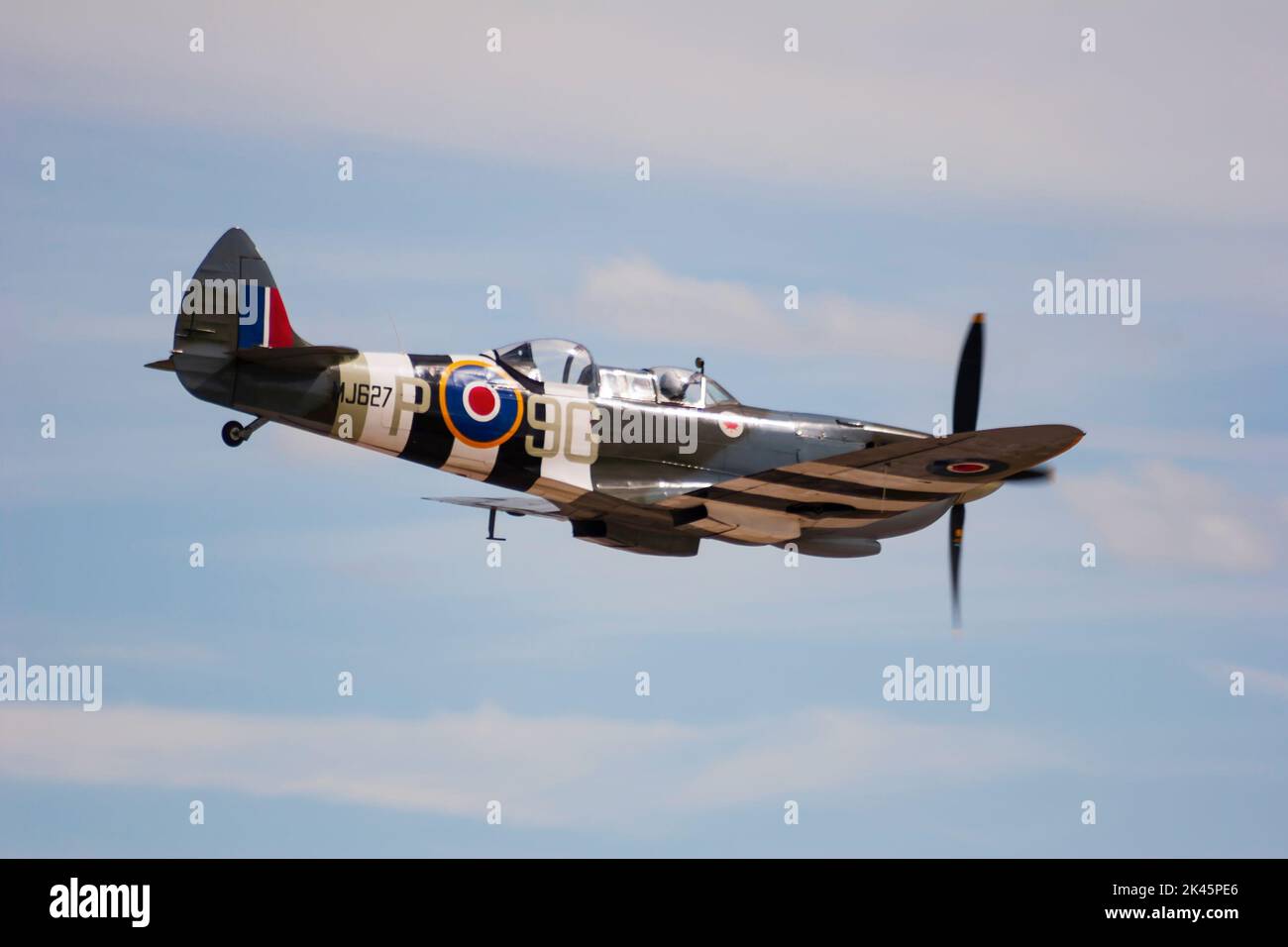 Private owned 2 seater trainer Spitfire Mk IXT, MJ627 airborne at RAF Waddington Air Show, 2005. Waddington, Lincolnshire, England. Stock Photo