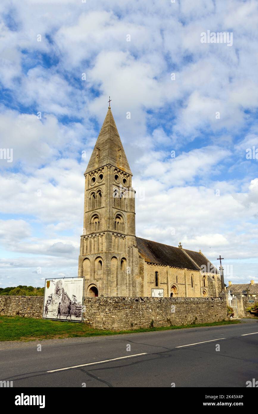 Church of Notre-Dame de l'Assomption de Colleville, with poster-sized photo of Allied advance during WW II, Colleville-sur-Mer, Normandy, France Stock Photo