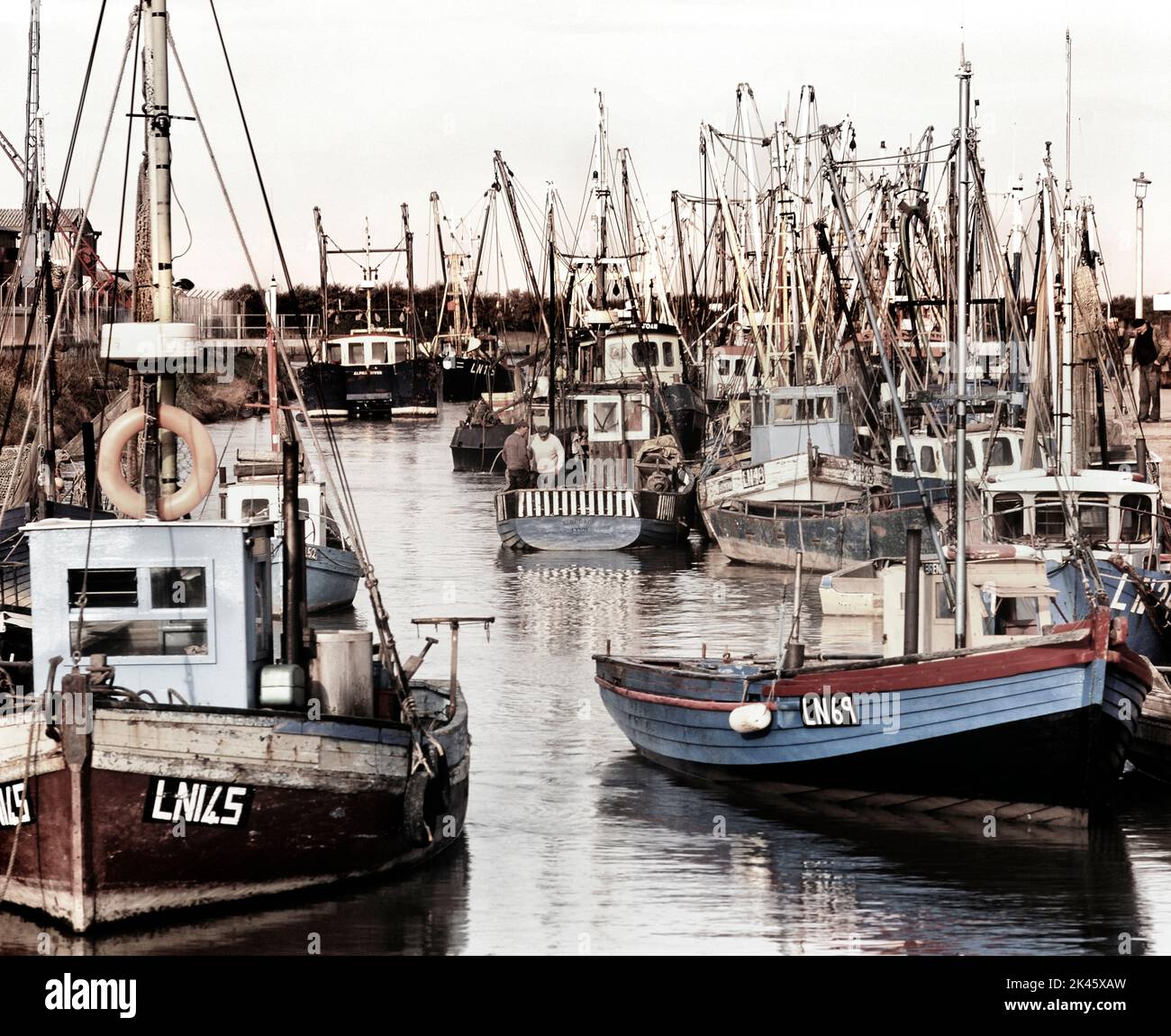 The Fisher fleet in harbour. King's Lynn. Norfolk, England. UK. Circa 1990's Stock Photo