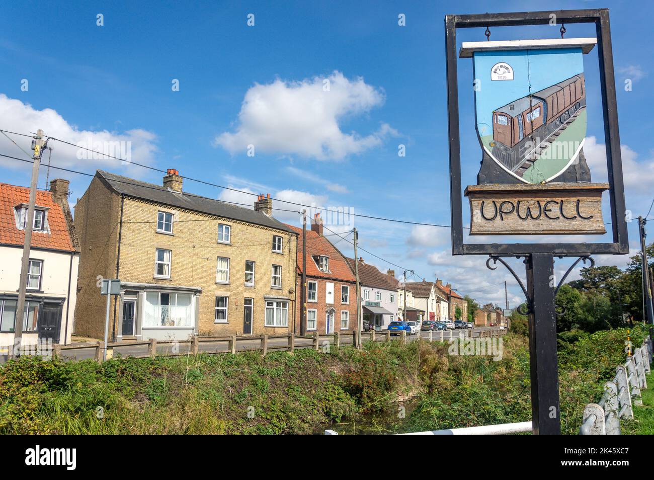 Village sign, New Road, Upwell, Norfolk, England, United Kingdom Stock Photo