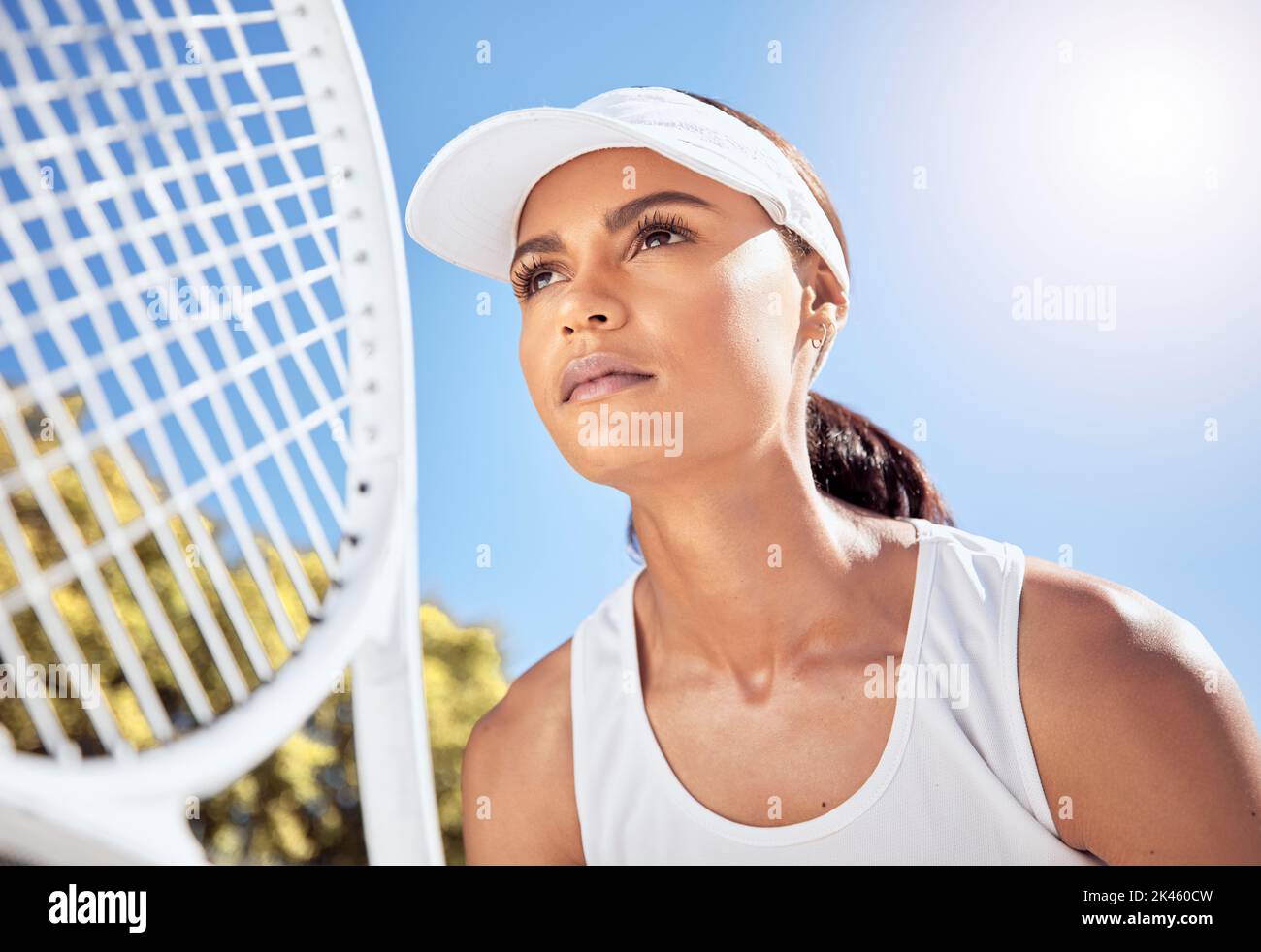 Fitness, vision and tennis by woman training at a tennis court in