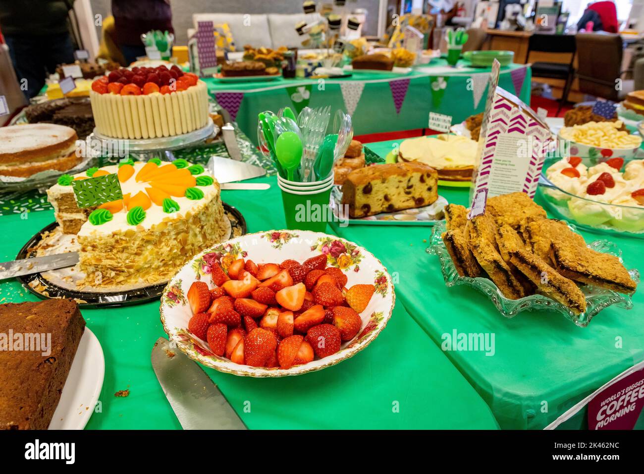 Friday 30 September 2022 - Stockton Heath, Warrington, Cheshire, England - World's Biggest Coffee Morning raising funds for Macmillan Cancer Support where tables full of cakes were available for people who made a donation Credit: John Hopkins/Alamy Live News Stock Photo