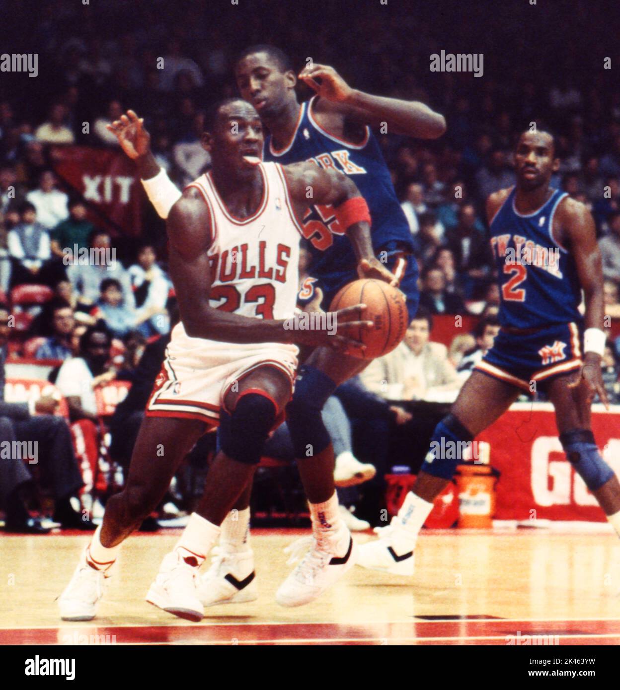 Michael Jordan of the Chicago Bulls drives to the basket against