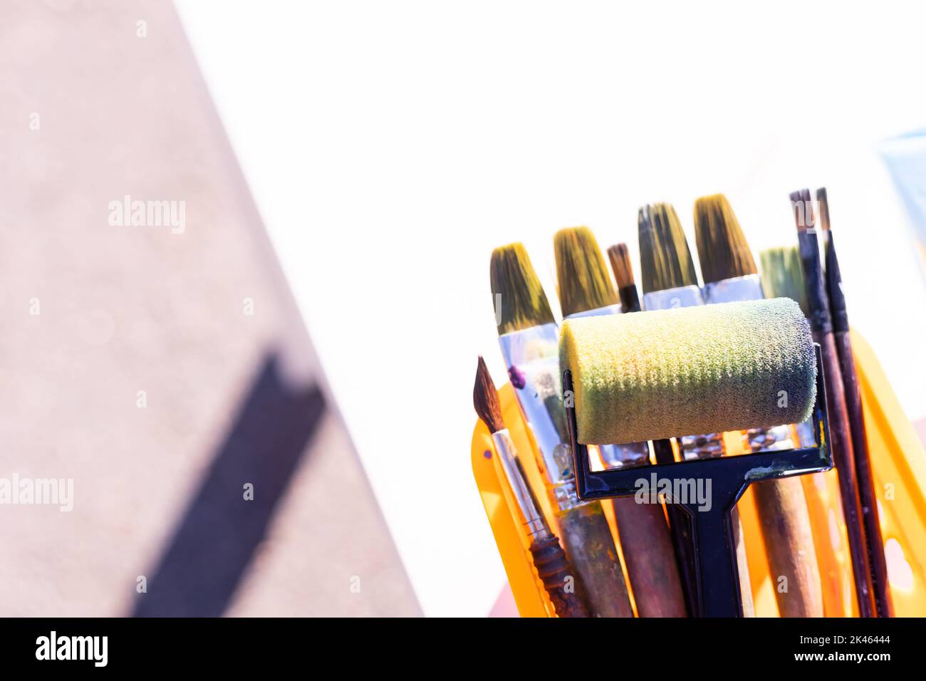 Painting tools on white background. Paint rollers, brushes Stock Photo
