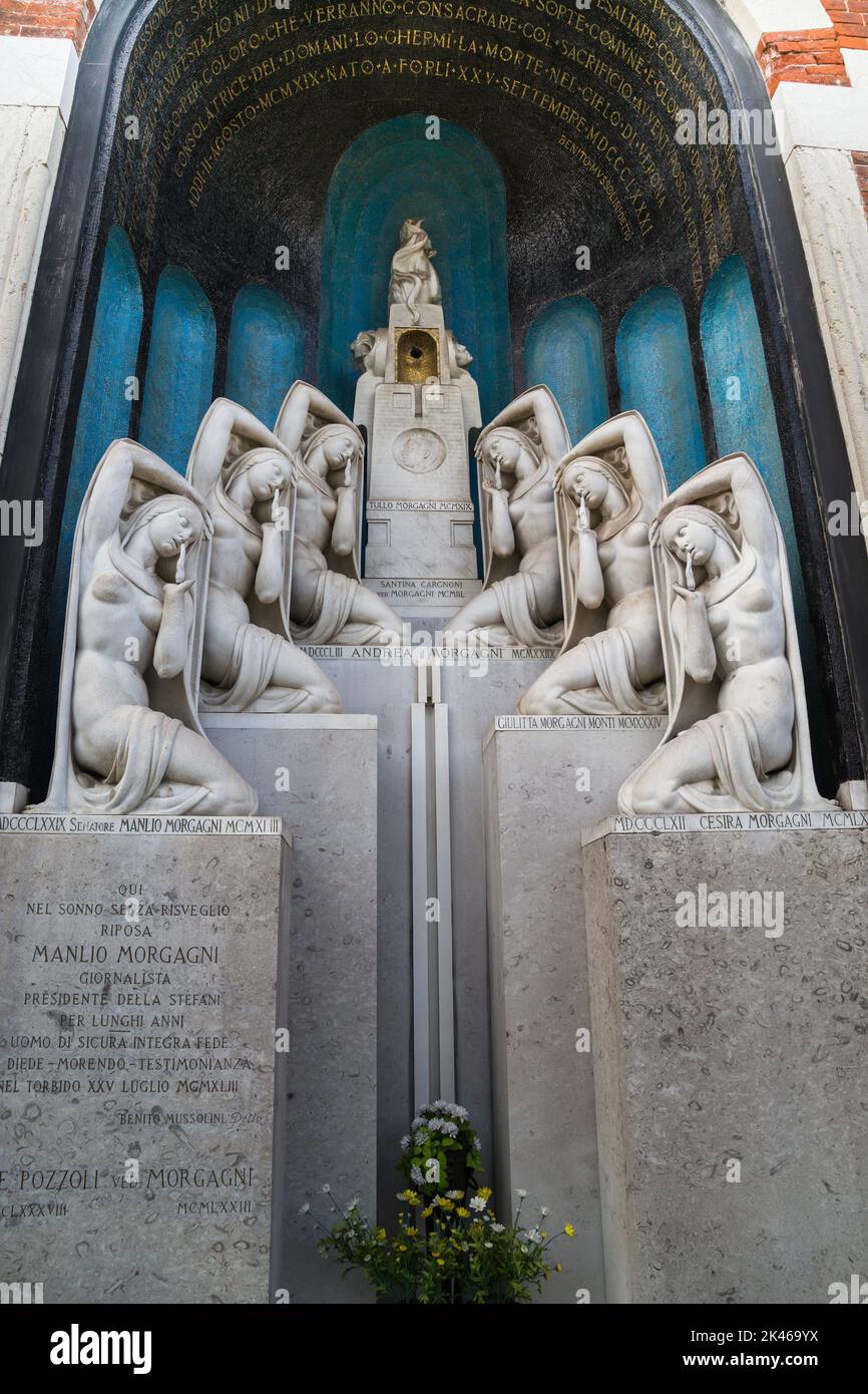 MILAN, ITALY - MAY 17, 2018: This is one of tombstones on the Monumental Cemetery, which is considered one of the richest tombstones and monuments in Stock Photo