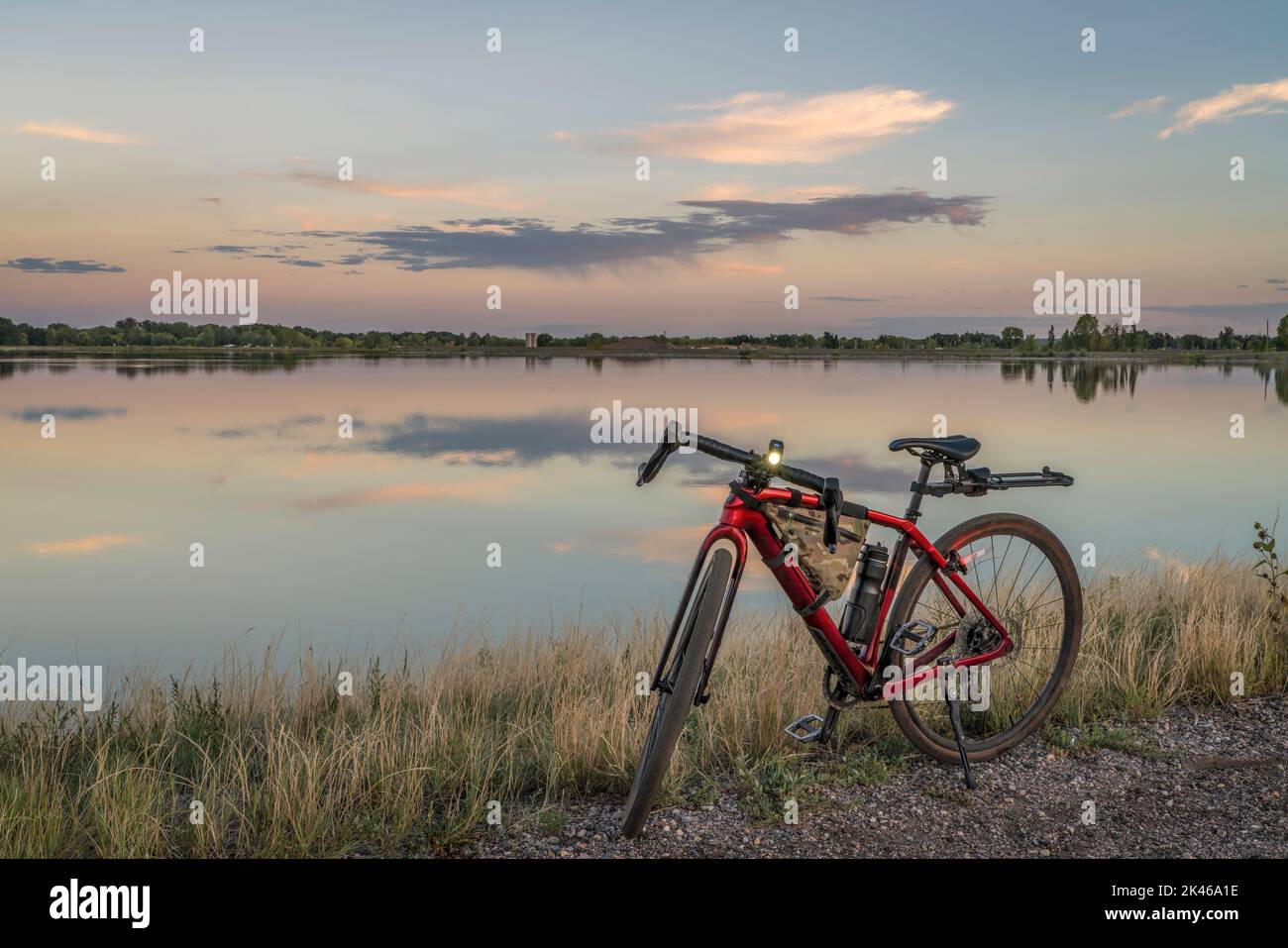 gravel bike with head and tail lights on a dirt road in Colorado countryside Stock Photo