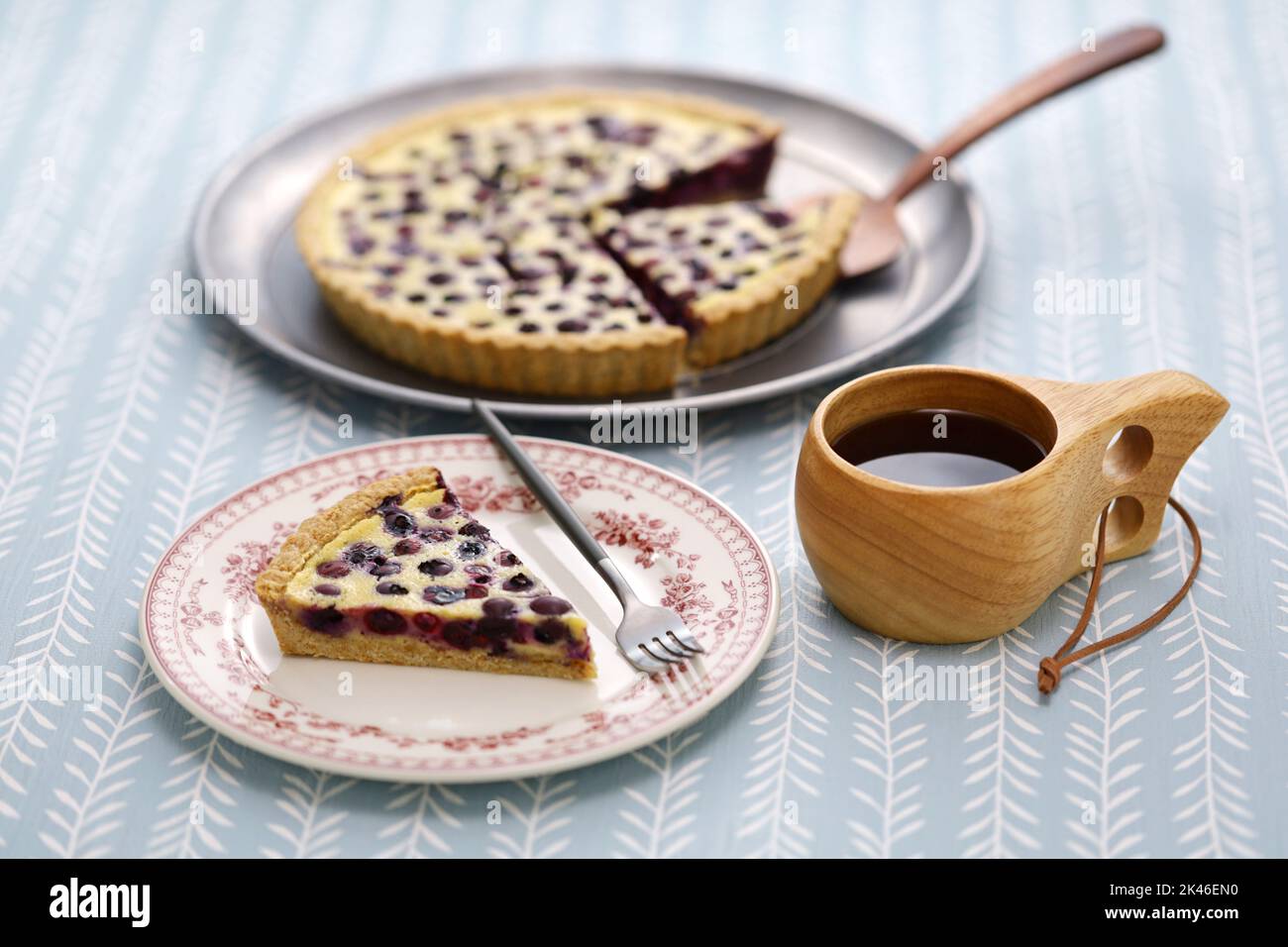 Finnish blueberry pie ( mustikkapiirakka ) and a Kuksa cup of coffee Stock Photo