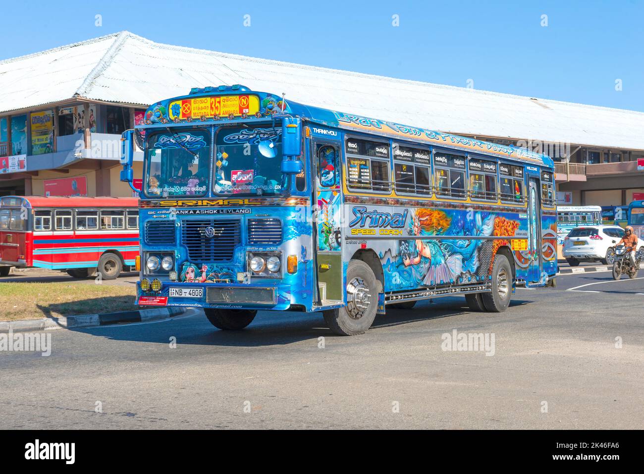 MATARA, SRI LANKA - FEBRUARY 17, 2020: Intercity bus with airbrushing on a city street Stock Photo