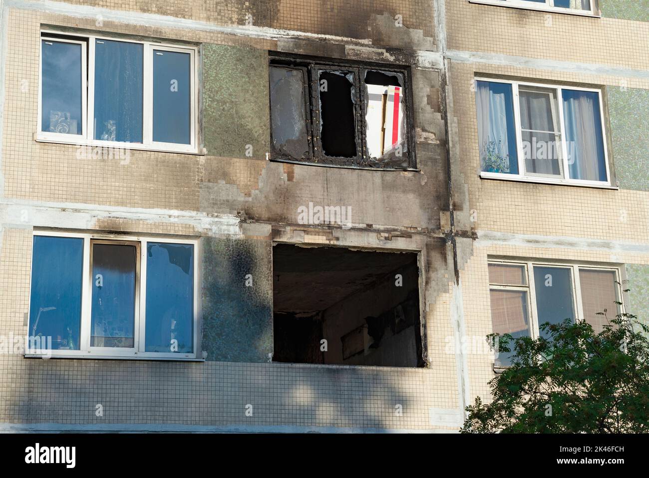 Windows of burntout apartments in a apartment building. Consequences