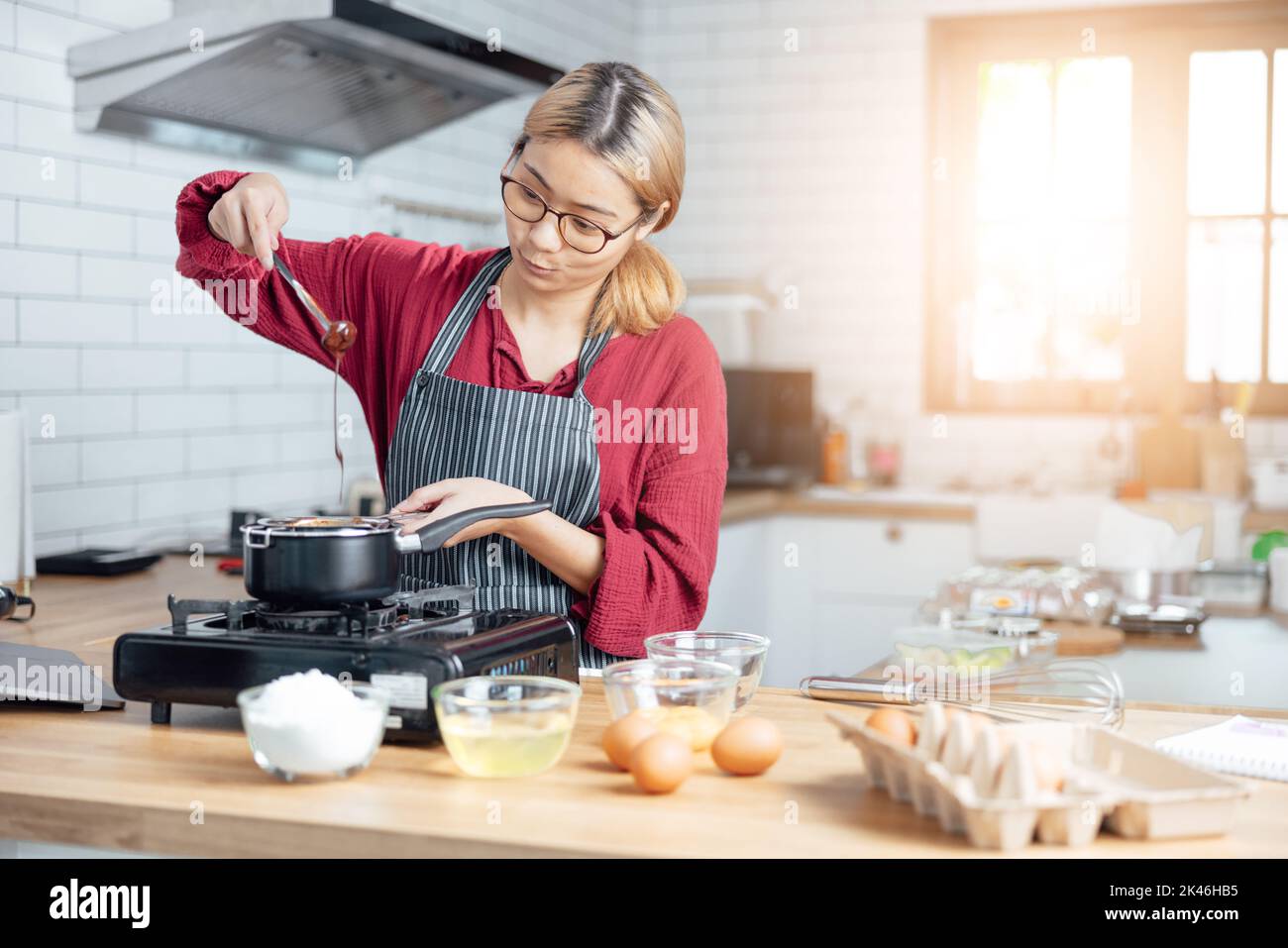 Young Woman Cooking Kitchen Stock Photo 427199368